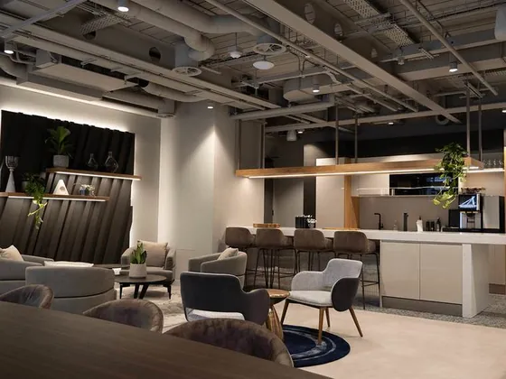 The member clubhouse at UNTIL Marylebone, with lounge seating and a coffee bar.